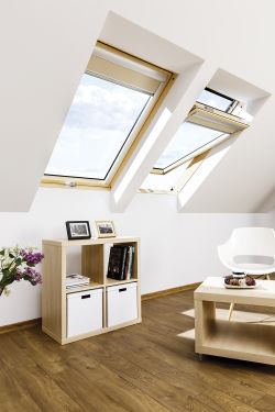Click Here To Enlarge This Photo Of FAKRO FTP-V P2 16 55cm x 118cm Z-Wave Double Glazed Anti-Burglary Electrically Operated Centre Pivot Roof Window Natural Pine - 876G16